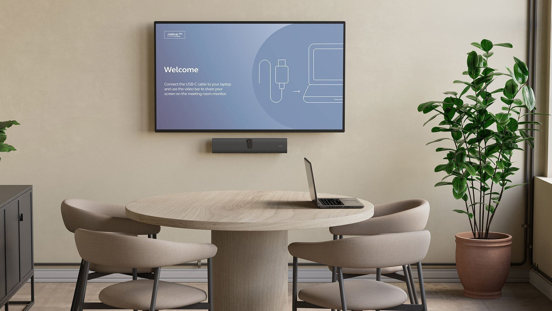 Jabra PanaCast U30 video bar installed in a small conference room