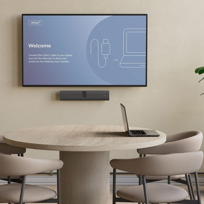 Jabra PanaCast U30 video bar installed in a small conference room