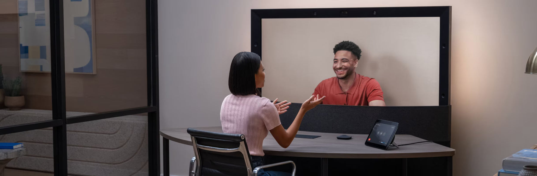 Google Beam immersive 3D video communication system featured in a modern enterprise meeting setup, highlighting life‑sized presence and next‑generation collaboration.