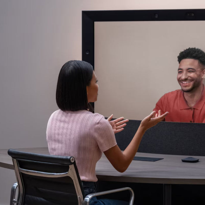 Google Beam immersive 3D video communication system featured in a modern enterprise meeting setup, highlighting life‑sized presence and next‑generation collaboration.