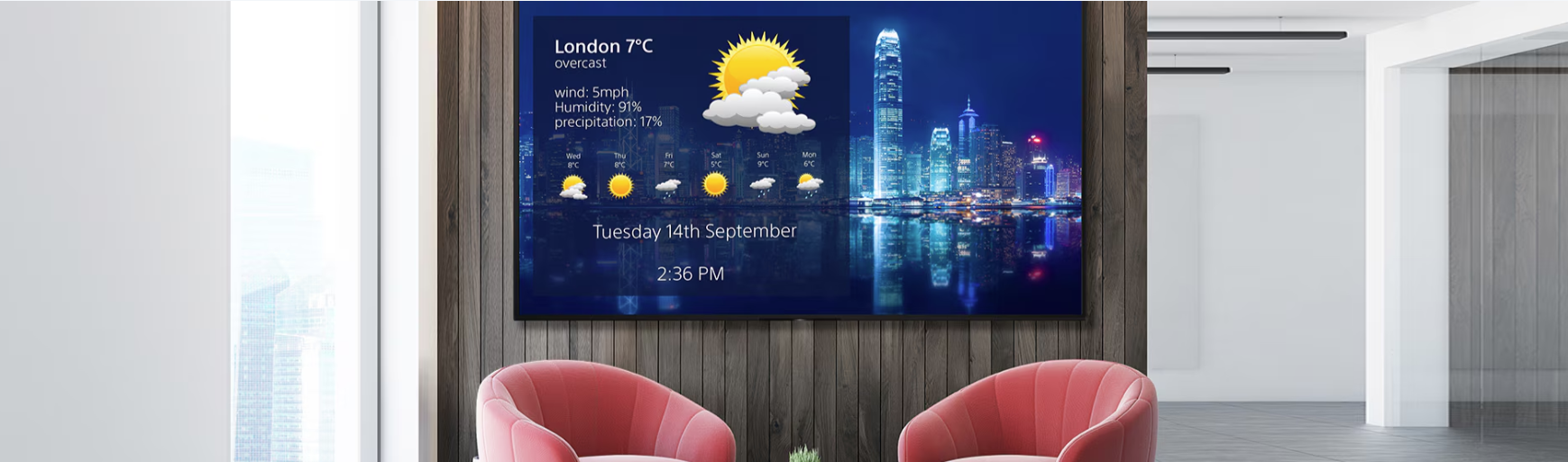 The Sony BZ40L display prominently featured in an office lobby, showcasing vibrant visuals and modern design, welcoming visitors with a weather information.